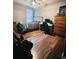 Comfortable bedroom features wood flooring and a bed next to a work station at 256 Copper Leaf Dr., Myrtle Beach, SC 29588
