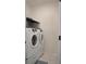 Bright laundry area with front loading washer and dryer and tiled floor at 256 Copper Leaf Dr., Myrtle Beach, SC 29588