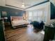 Spacious primary bedroom with tray ceilings and abundant natural light at 256 Copper Leaf Dr., Myrtle Beach, SC 29588