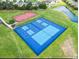 Aerial view of well-maintained tennis and basketball courts in a community setting at 256 Copper Leaf Dr., Myrtle Beach, SC 29588