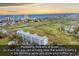Enjoy this aerial view showcasing the condo's proximity to the ocean at 300 Marsh Pl. # 302A, Garden City Beach, SC 29576