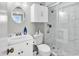 Modern bathroom features marble shower with glass door, storage, and updated fixtures at 300 Marsh Pl. # 302A, Garden City Beach, SC 29576