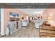 Bright living room boasts modern decor and comfortable seating arrangements at 300 Marsh Pl. # 302A, Garden City Beach, SC 29576