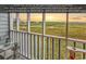 Breathtaking views from the porch offer far-reaching inlet & ocean vistas at 300 Marsh Pl. # 302A, Garden City Beach, SC 29576