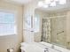 Comfortable bathroom with a large mirror, vanity with drawers and a shower/tub combination, enhancing daily living at 312 Norris Dr., Pawleys Island, SC 29585