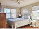 Cozy bedroom featuring hardwood floors, natural light, and classic decor, creating a warm and inviting space at 312 Norris Dr., Pawleys Island, SC 29585