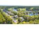 Serene aerial view of waterfront homes nestled within a beautiful green landscape at 366 Pinehurst Ln. # 13E, Pawleys Island, SC 29585