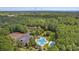 Picturesque aerial view of community amenities including a pool and tennis courts at 366 Pinehurst Ln. # 13E, Pawleys Island, SC 29585