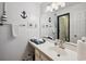 Nautical themed bathroom featuring a sink and vanity and ample lighting at 366 Pinehurst Ln. # 13E, Pawleys Island, SC 29585