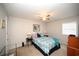 Cozy bedroom featuring comfortable bedding, ceiling fan, neutral walls and natural light at 4150 Horseshoe Rd. N # 8, Little River, SC 29566