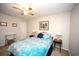 Inviting bedroom with ceiling fan, side tables, wall art, comfortable bed and neutral decor at 4150 Horseshoe Rd. N # 8, Little River, SC 29566