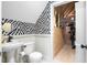 Stylish half bathroom with decorative wall paper at 4228 Ravenwood Dr., Little River, SC 29566