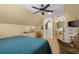 Comfortable bedroom leads to on-suite bathroom at 4228 Ravenwood Dr., Little River, SC 29566