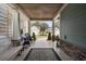View through front porch showcasing outdoor seating at 4228 Ravenwood Dr., Little River, SC 29566