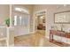Bright foyer with hardwood floors, glass-paneled front door and a decorative table at 432 Highfield Loop, Myrtle Beach, SC 29579