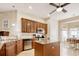 Charming kitchen featuring a center island, stainless appliances, and tile backsplash at 432 Highfield Loop, Myrtle Beach, SC 29579