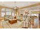 Spacious living room with comfortable seating, ceiling fan, and open access to the kitchen at 432 Highfield Loop, Myrtle Beach, SC 29579