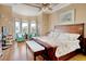 Spacious bedroom with ample natural light, wood floors, and a decorative nautical theme color scheme at 432 Highfield Loop, Myrtle Beach, SC 29579
