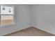 Carpeted bedroom featuring a single window, gray walls, and neutral carpet at 48 Cape Point Dr., Conway, SC 29527