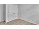 Bedroom with carpeted floor, gray walls, and closet with bifold doors at 48 Cape Point Dr., Conway, SC 29527