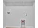 A laundry room with washer and dryer hookups and shelving is displayed at 48 Cape Point Dr., Conway, SC 29527