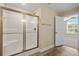 Bathroom featuring a walk-in shower and a doorway to another room at 480 Oakham Dr., Conway, SC 29527