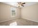Bedroom with a beige carpet, window and ceiling fan at 480 Oakham Dr., Conway, SC 29527