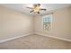 Bedroom with a beige carpet, window and ceiling fan at 480 Oakham Dr., Conway, SC 29527