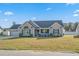 Charming single-story home with well-manicured lawn and inviting entrance at 480 Oakham Dr., Conway, SC 29527