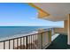 Breathtaking oceanfront balcony showcases the view of the beach and clear blue skies, perfect for relaxation and serenity at 501 S Ocean Blvd. # 1006, North Myrtle Beach, SC 29582