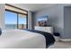 Bedroom featuring ocean views and a modern entertainment center at 501 S Ocean Blvd. # 1006, North Myrtle Beach, SC 29582