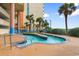 Lazy river winding through the resort-style pool area provides relaxation and recreation for all ages at 501 S Ocean Blvd. # 1006, North Myrtle Beach, SC 29582