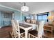Charming dining area with seating for six and a view of the ocean at 501 S Ocean Blvd. # 1006, North Myrtle Beach, SC 29582