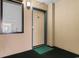 Condo front door with a green welcome mat outside at 501 S Ocean Blvd. # 1006, North Myrtle Beach, SC 29582