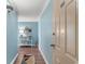 Hallway with blue walls and decor at 501 S Ocean Blvd. # 1006, North Myrtle Beach, SC 29582