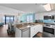 Kitchen with granite countertops and ocean view at 501 S Ocean Blvd. # 1006, North Myrtle Beach, SC 29582