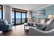 Bright living room with comfortable seating, ocean views, and stylish decor at 501 S Ocean Blvd. # 1006, North Myrtle Beach, SC 29582