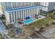 An aerial perspective showing the array of outdoor amenities, including pools, splash pad, beach access, and a modern hotel building at 5200 N Ocean Blvd. # 957, Myrtle Beach, SC 29577