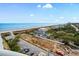 Breathtaking balcony view showcasing the serene ocean, expansive beach, and beautiful coastal landscape at 5200 N Ocean Blvd. # 957, Myrtle Beach, SC 29577
