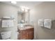 Bright bathroom featuring vanity with granite counters, wood cabinets, and a well-lit mirror at 5200 N Ocean Blvd. # 957, Myrtle Beach, SC 29577