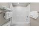 Shower-tub combo featuring a white shower and brushed nickel fixtures at 5200 N Ocean Blvd. # 957, Myrtle Beach, SC 29577