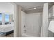 Shower-tub combo with a full shower curtain next to a bedroom that overlooks the ocean at 5200 N Ocean Blvd. # 957, Myrtle Beach, SC 29577