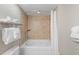 Bathroom features a soaking tub with shower and tile surround, plus storage at 5200 N Ocean Blvd. # 957, Myrtle Beach, SC 29577