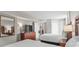 Bedroom suite with two beds, wood furniture, and a TV at 5200 N Ocean Blvd. # 957, Myrtle Beach, SC 29577