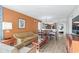 Inviting living room with a sofa, chairs, dining table, and TV at 5200 N Ocean Blvd. # 957, Myrtle Beach, SC 29577