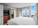 Inviting main bedroom with private balcony access, plush bedding, and ample closet space for a comfortable retreat at 5200 N Ocean Blvd. # 957, Myrtle Beach, SC 29577
