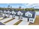 Townhomes with garages, white siding, and black roofs at 564 Sea Sparrow St. # 564, Myrtle Beach, SC 29588
