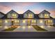 Inviting townhouse exterior featuring individual driveways and well-lit entryways at 564 Sea Sparrow St. # 564, Myrtle Beach, SC 29588