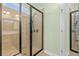 Modern bathroom features a glass enclosed shower with tile surround and dual shower heads at 570 Botany Loop Murrells Inlet # 570, Murrells Inlet, SC 29576