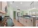 Well-equipped kitchen featuring a gas cooktop, stainless steel appliances, and granite counters at 570 Botany Loop Murrells Inlet # 570, Murrells Inlet, SC 29576